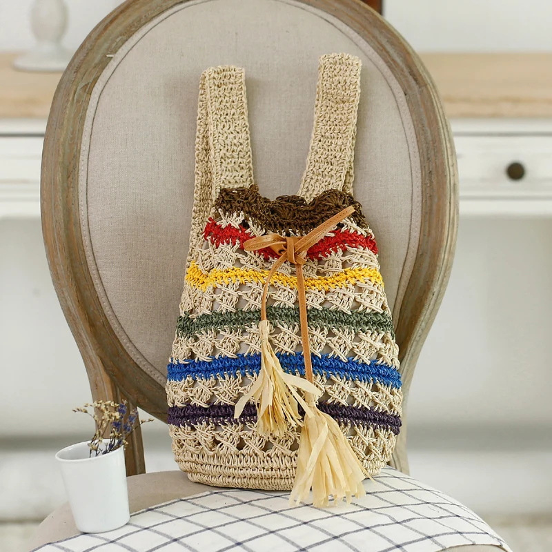 

2019 Fashion Japanese New Fresh Color Stripes Backpack Hot Sale Straw Grass Beach Bag Knitting Woven Women's Handmade Straw Bag