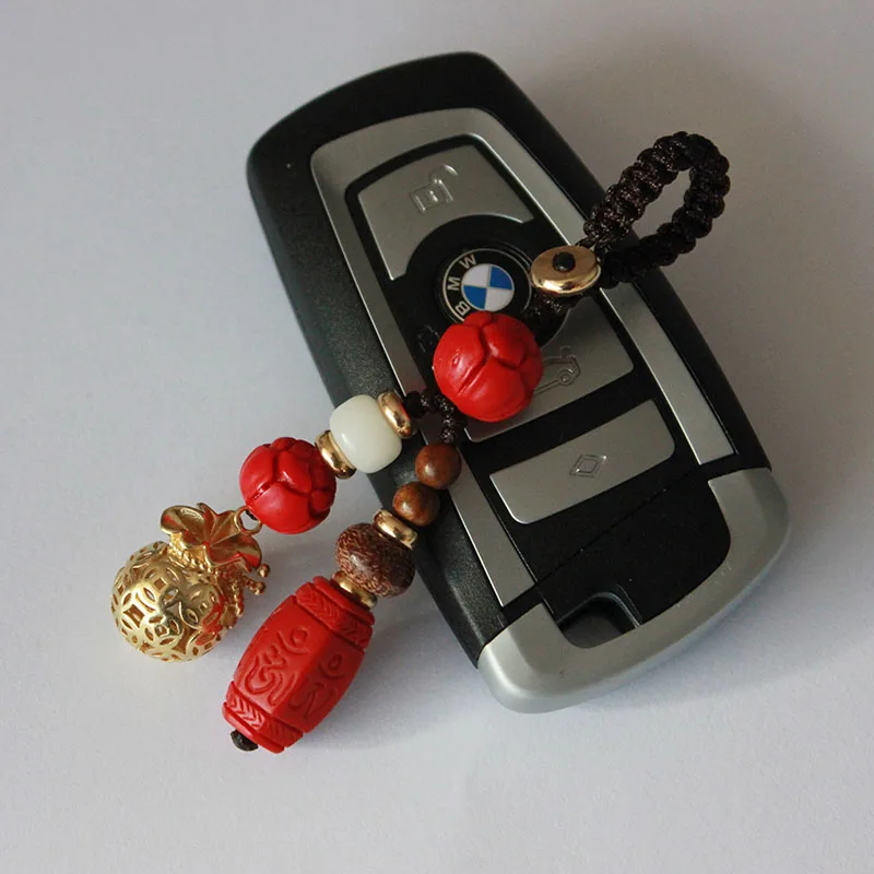

Car key chain high-grade hand-woven money bag lucky pure copper bell bag bag pendant cinnabar six-word mantra