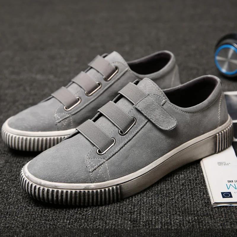 

Factory direct 2019 new Korean version Pure color pigskin wild flat shoes youth trend Velcro student casual single shoes men