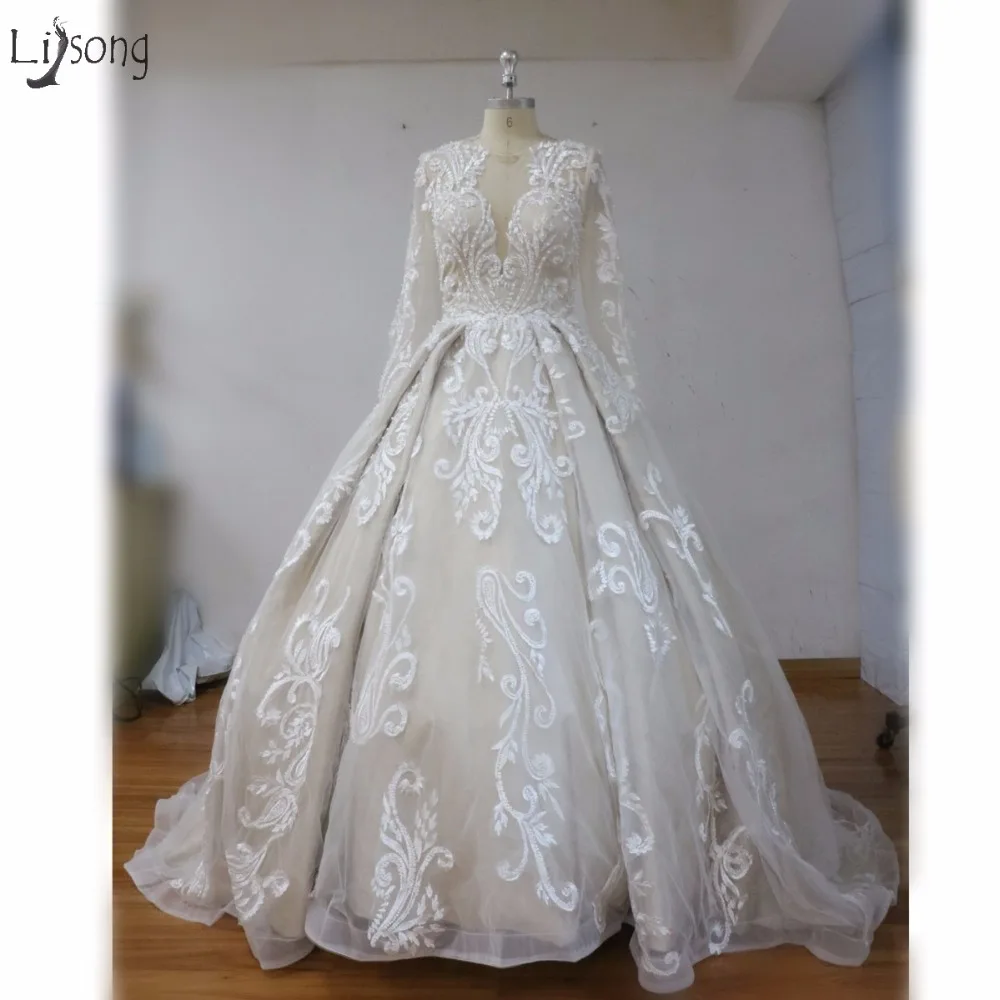 

Special Lace Modest Wedding Dresses With Full Sleeves A-line Double V-neck Bridal Gowns Saudi Arabic Wedding Gowns 2018