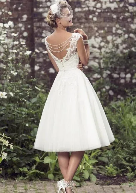 2017-elegant-tea-length-wedding-dresses-v-neck-cap-sleeves-appliques-lace-tulle-ball-gown-short-wedding-dresses (2)_