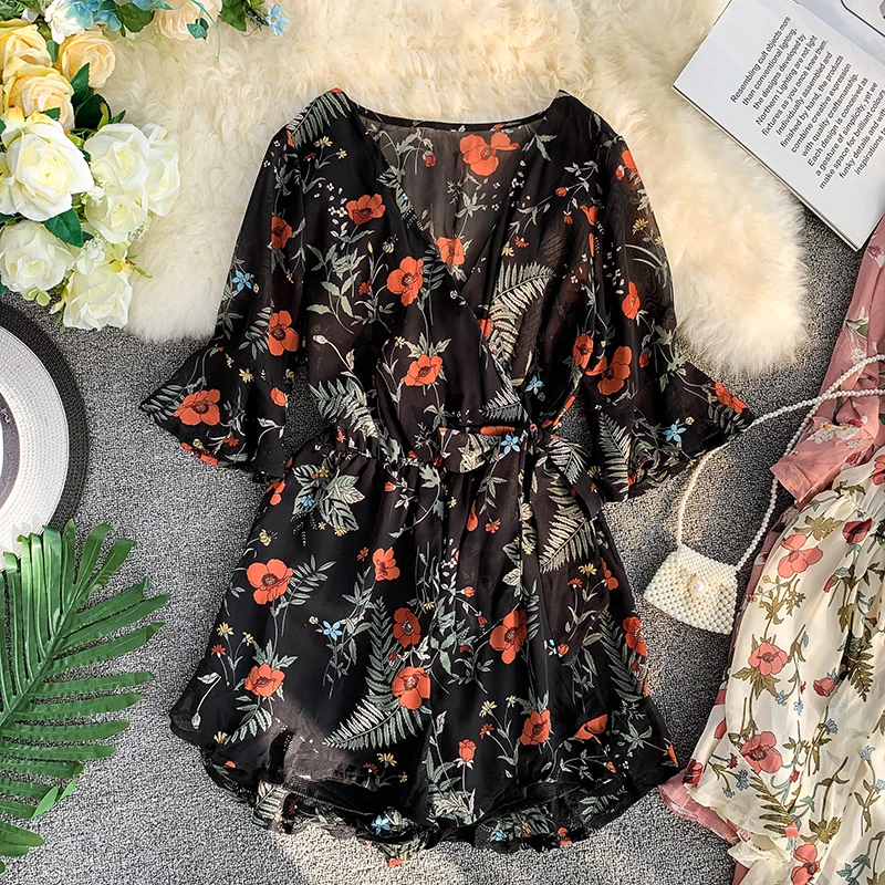

Fresh chiffon print V-neck flared sleeves elastic waist tie ruffled wide-leg shorts beach jumpsuit