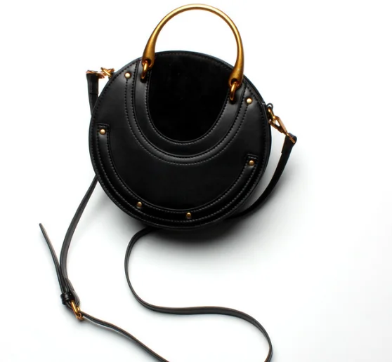

2018 Ladies Fashion Genuine Leather Retro Metal Handbag Designer Evening Party Small Round Bag Rivet Shoulder Messenger Bag Q058