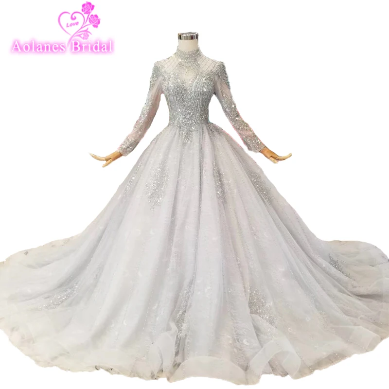 

Dubai Luxury Crystal Prom Dresses With Sheer Full Sleeves 2019 Shiny Beaded Telass Grey High Neck Bridal Prom Party Gowns