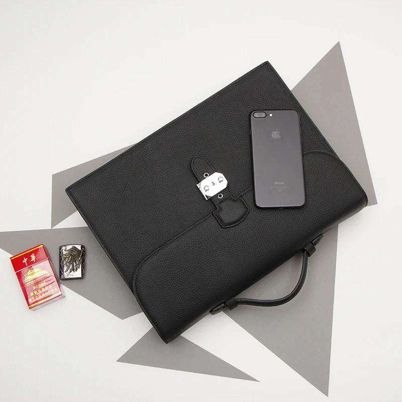 

Simple Men's Genuine Leather Business Bag Cowhide Laptop Handbag Large Capacity Briefcase.