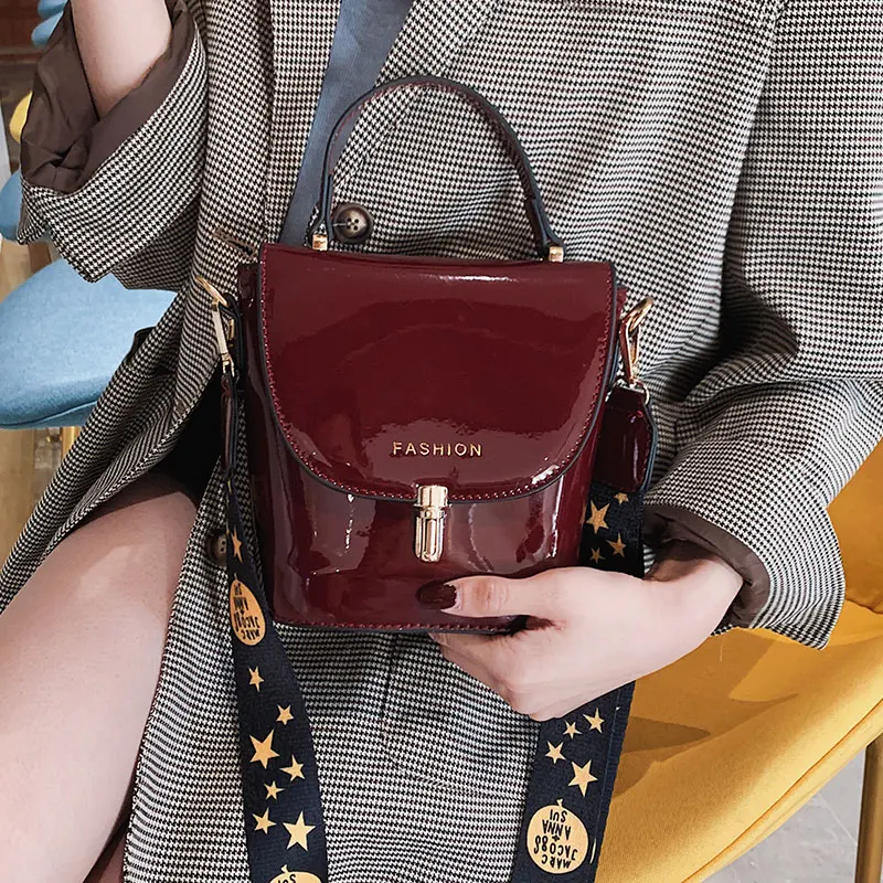 

Female 2019 new portable patent leather wide shoulder bag fashion wild Messenger bucket bag