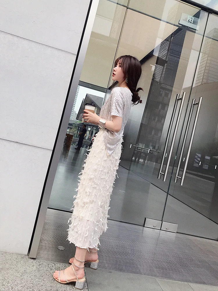 Стильная Корейская версия свежей милой женской плиссированной юбки с перьями и кисточками, прямые женские юбки