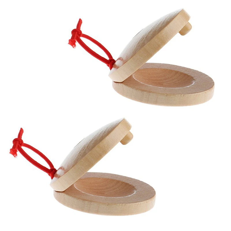 

A pair of wooden flamenco musical instrument castanets of wood color percussion instrument