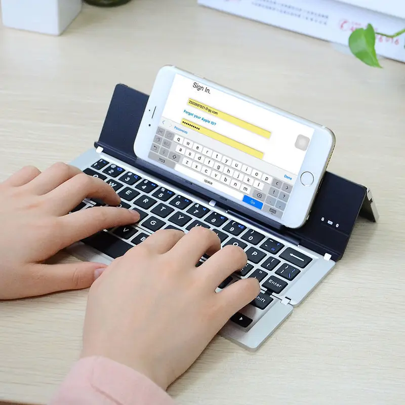 

Basix Mini Bluetooth Wireless Keyboard Aluminum Slim Mini Bluetooth Folding Keyboard for Windows Android IOS PC Smart Phones