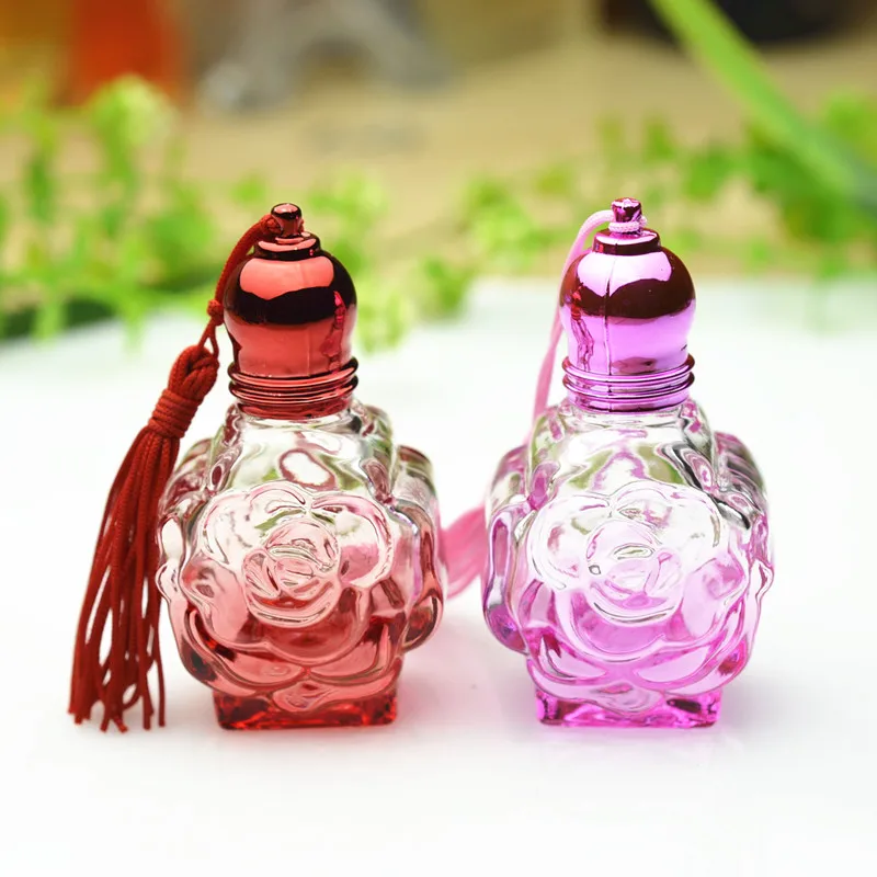 Refillable 10ml Women Perfume Glass Roll on Bottle with Tassel Rose Cosmetic Water Roller Bottle