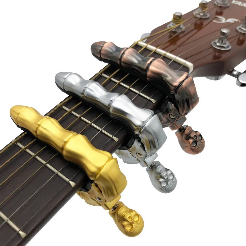 SLOZZ cráneo Guitarra Capo 6 cadena clásica acústica Guitarra eléctrica bajo accesorios Metal Capotraste Guitarra hueso del dedo SLOZZ cráneo Guitarra Capo 6 cadena clásica acústica Guitarra eléctrica bajo accesorios Metal Capotraste Guitarra hueso del dedo