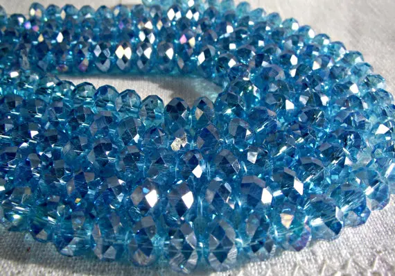 

Free Shipping AB Aqua Blue 600pcs Strand 12x8mm Crystal beads AAA Top Quality Crystal Glass Faceted Rondelle Loose Bead