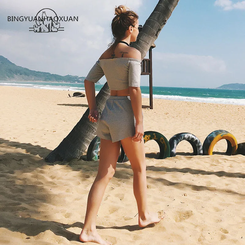 

BINGYUANHAOXUAN Sexy Cross Strap for the 2018 Suit with a One-Word Collared Shoulder Jacket and Wide-Leg Shorts.