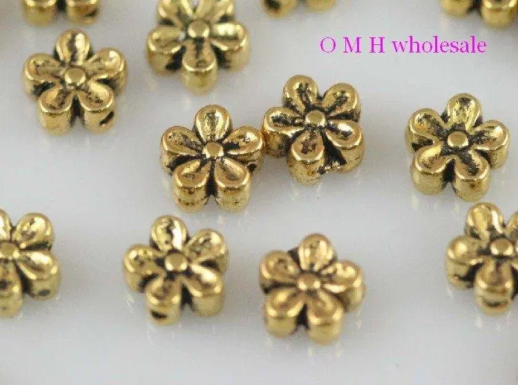 

OMH wholesale Free ship 30pcs golden flower spacer beads Jewelry metal beads 7mm ZL511