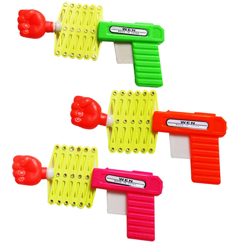 Elastic Flexible Stretching Fist Gun Toy Children Practical Joke Gag