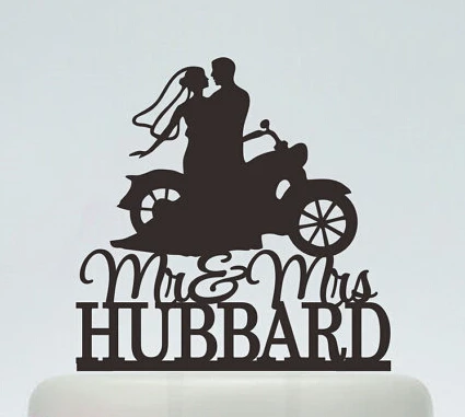 https://ae01.alicdn.com/kf/HTB1YZ9OKXXXXXbPXXXXq6xXFXXXq/custom-glitter-Wedding-Cake-Toppers-Bride-And-Groom-On-motorcycle-Silhouette-party-decorations.jpg