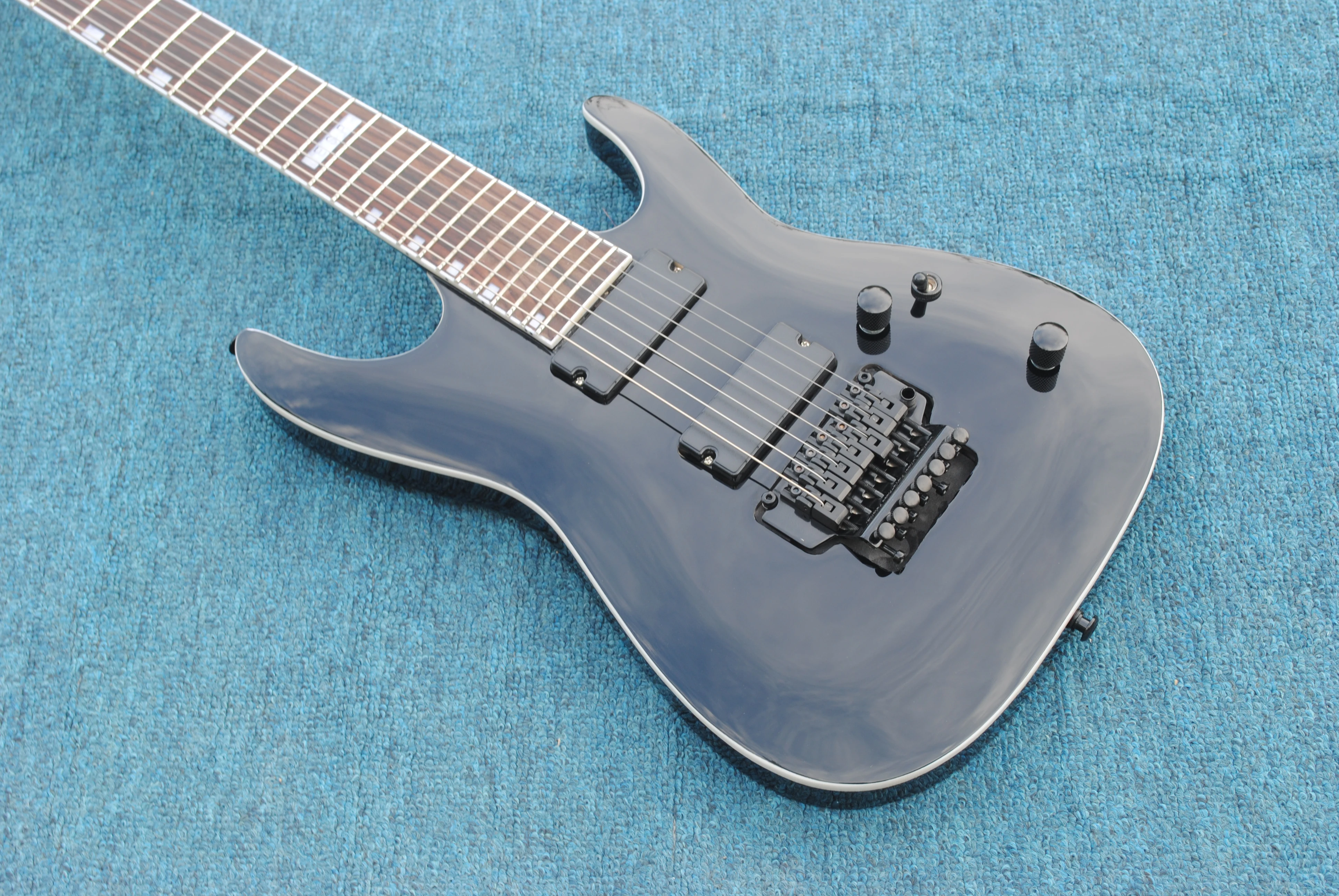

New high quality custom 7 string electric guitar, black freudian double swing bridge, one piece connection, black light color, f