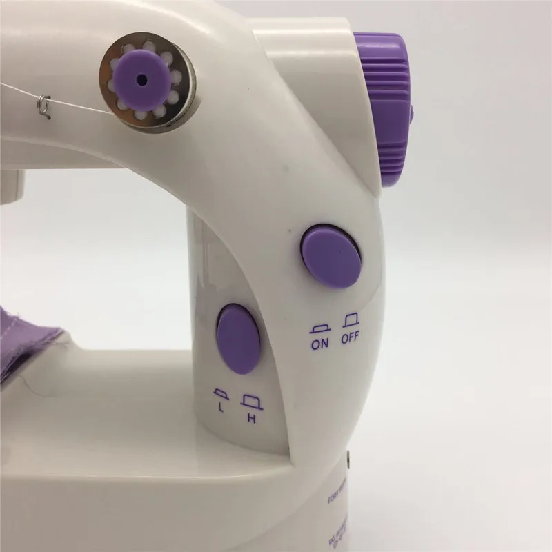 Portable ewing machines Mini Handheld sewing machines Sew needlework Cordless Clothes Fabrics Manual Household Sewing Machine
