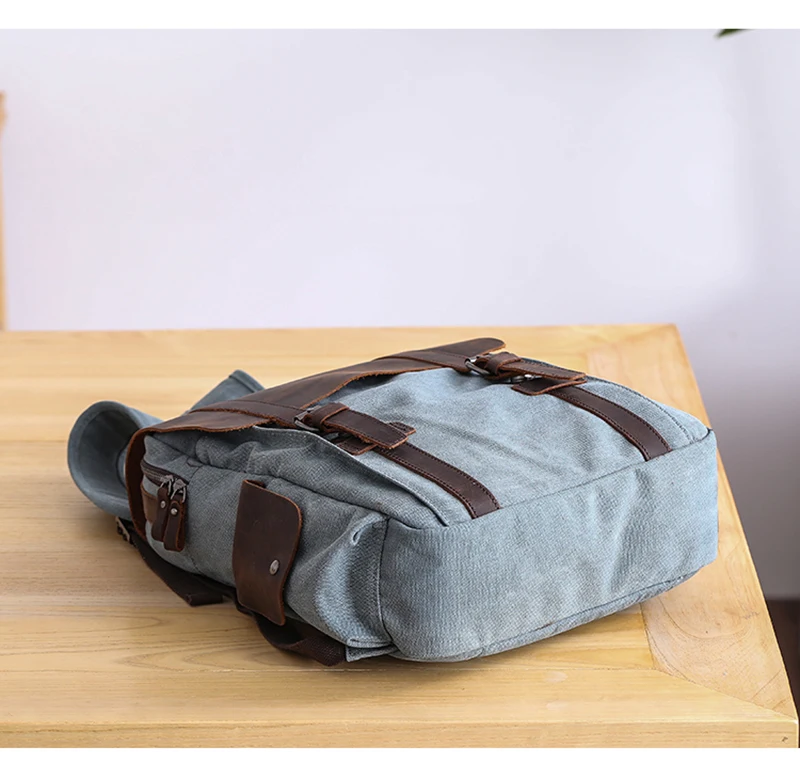 Manitoba Small Canvas Backpack on a table