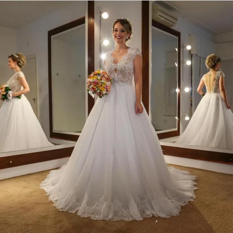 2018-a-line-wedding-dresses-elegant-v-neck-cap-sleeves-lace-applique-beaded-sheer-back-with-buttons-sequins-floor-length-arabic-bridal-gowns (2)