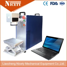 

free shipping,NT-20w metal fiber protable laser marking machine with 110*110mm, 75*75mm working table