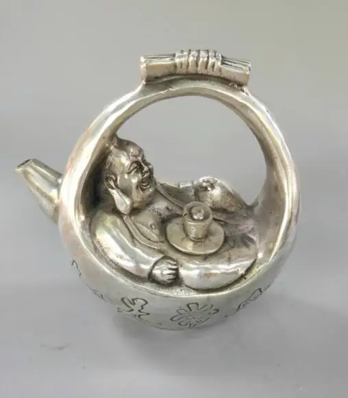 Chinese exquisite handicraft white copper maitreya Buddha teapot Chinese exquisite handicraft white copper maitreya Buddha teapot