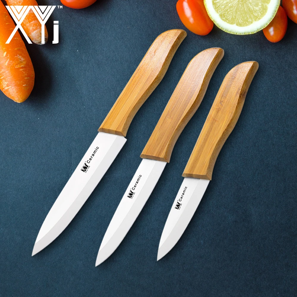

XYj Ceramic Kitchen Knife Set Chef Kitchen Knives Ultra Sharp Zirconium Blade Bamboo Handle Knife Ceramic Chef Cooking Tools