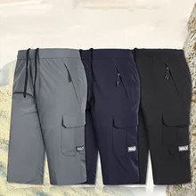 Повседневные спортивные мужские укороченные шорты большого размера с карманами быстросохнущие мужские брюки летние свободные мужские пляжные шорты с застежкой-молнией