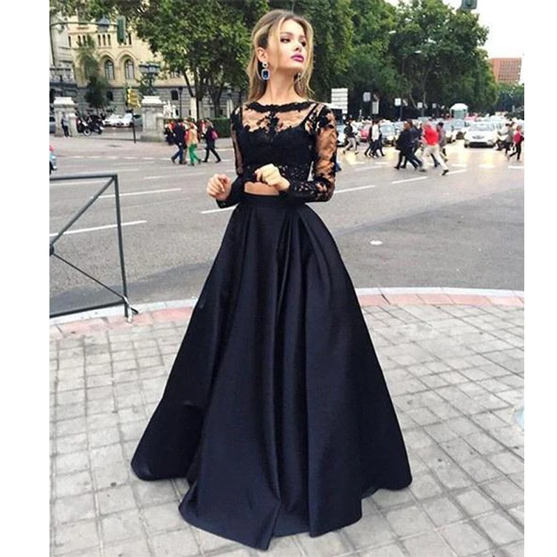 Vestido negro de dos piezas con mangas de encaje