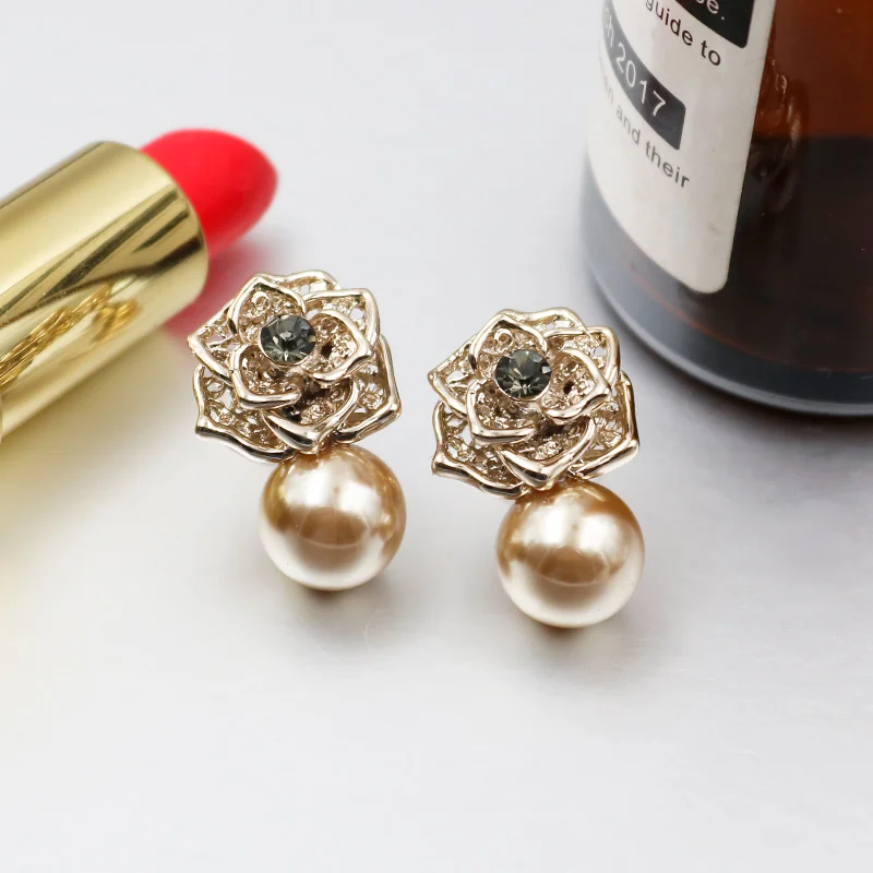 

European and American fashion rose pearl alloy hundred tie party ear nail womanhood adornment ear nail