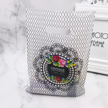 

Plastic Gift Shopping Bags 100pcs/lot 15x20cm Black Big Flower Plastic Jewelry Gift Shopping Pouches Bags H2012
