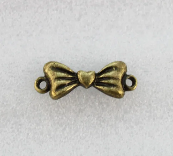 

80PCS Antiqued Bronze Heart Knot Link Connectors 22x8mm #23168