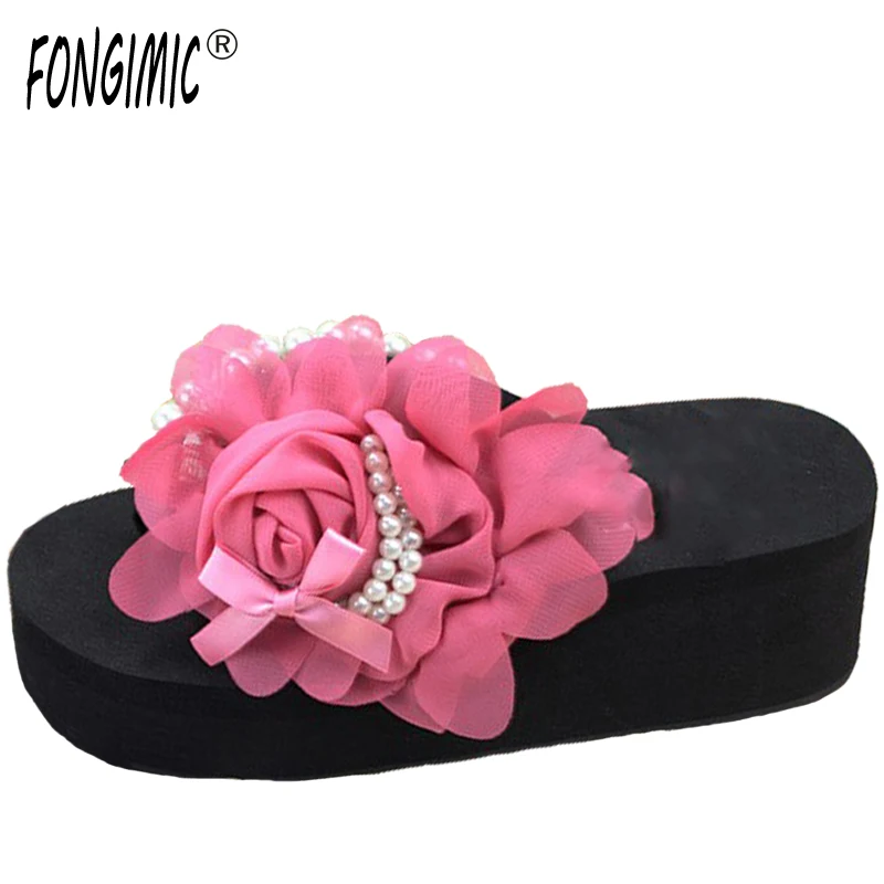 flip flops with flowers on top