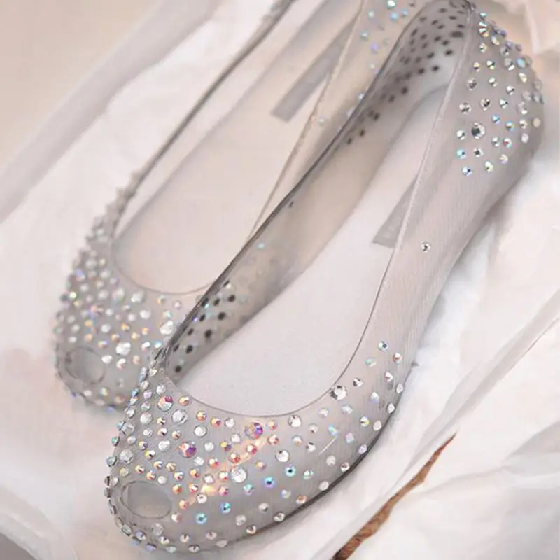 

2018 new transparent jelly shoes flat crystal shoes female fish mouth sandals.