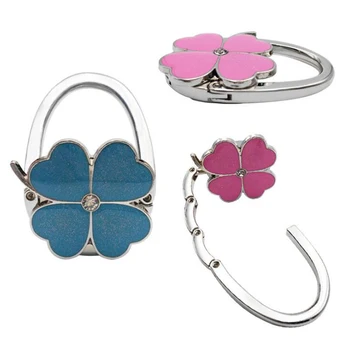 

Free shipping 300pcs/lot Folding Handbag/Purse/Bag Hanger Table Hook Hang Holder Four Leaf Clover