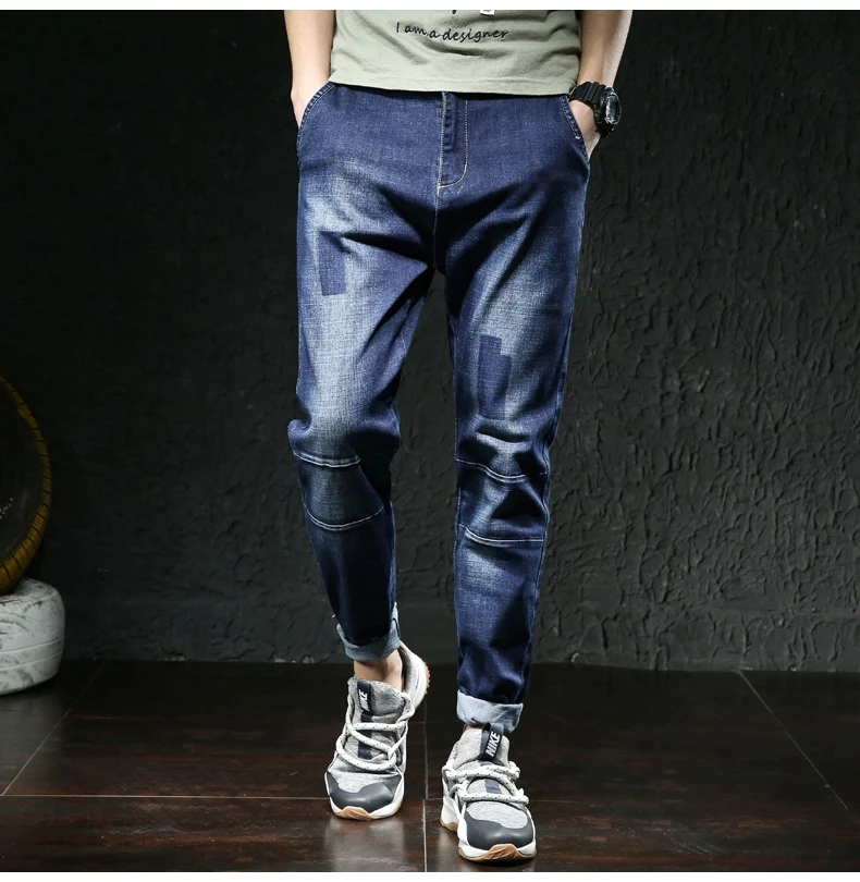 Большие размеры джинсы мужские Весна новые мужские модные рваные зауженные джинсы эластичные повседневные брюки брендовая одежда синий черный