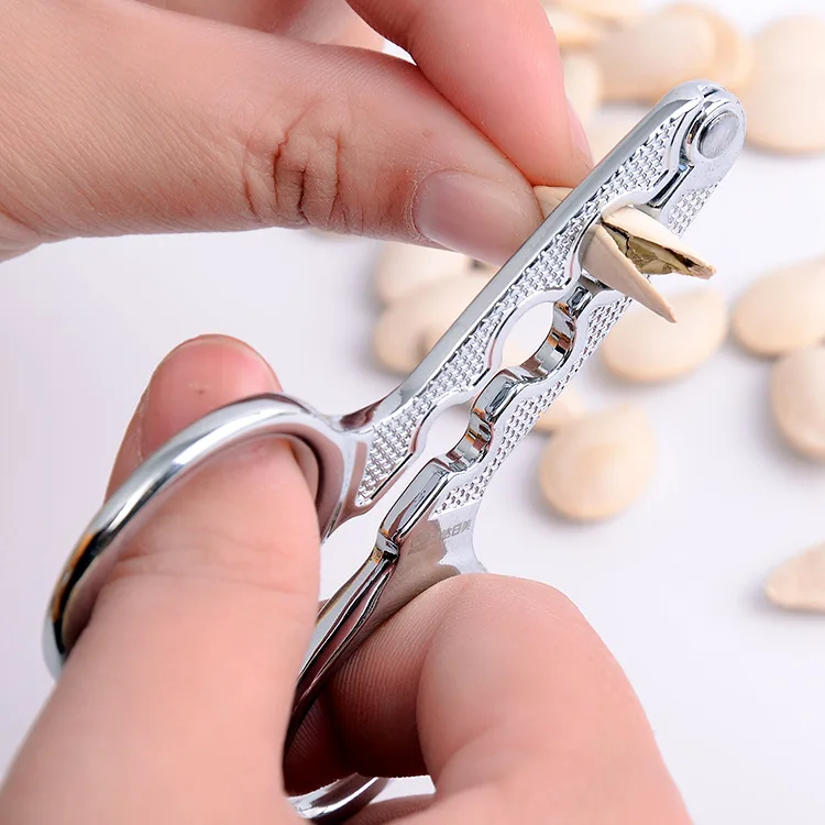 

Multifunctional Stainless Steel Seed Cracker Black Melon Seeds / Pistachio/ White Melon Seeds Nuts Sheller galleta Free Shipping