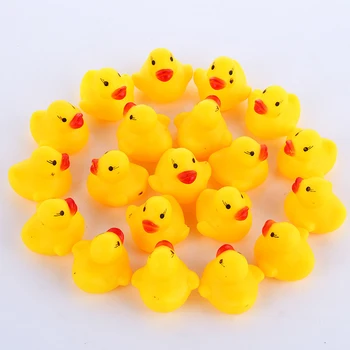 100pcs/lot Squeaky Rubber Duck Duckie Bath Toys Baby Shower Water Toys for baby Children Birthday Favors Gift free shipping 1