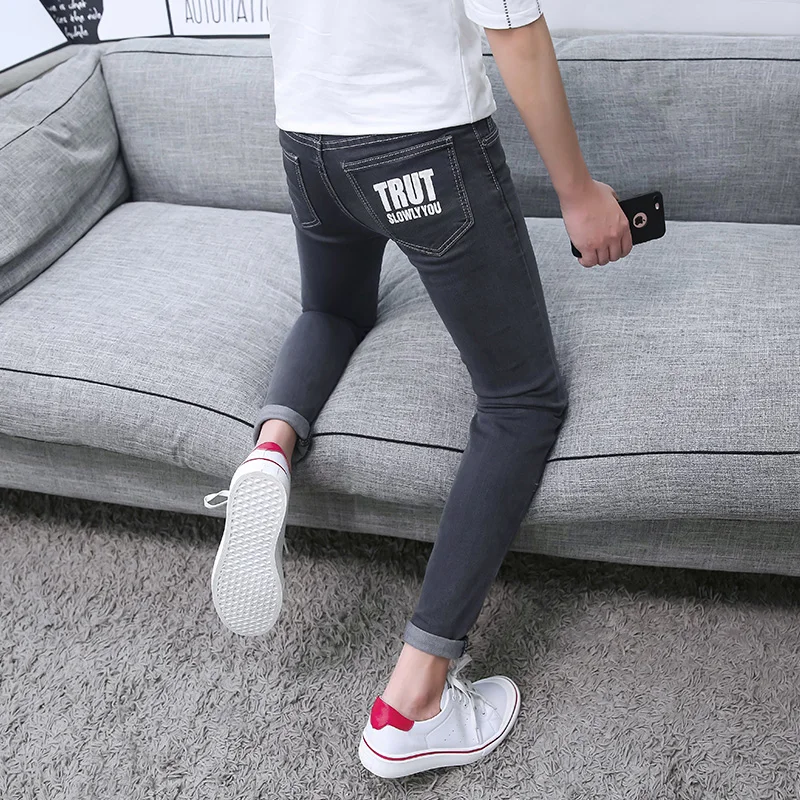 Spring and Autumn break hole 99 points jeans men's Korean version repair pantyhose fashion men's MC 146