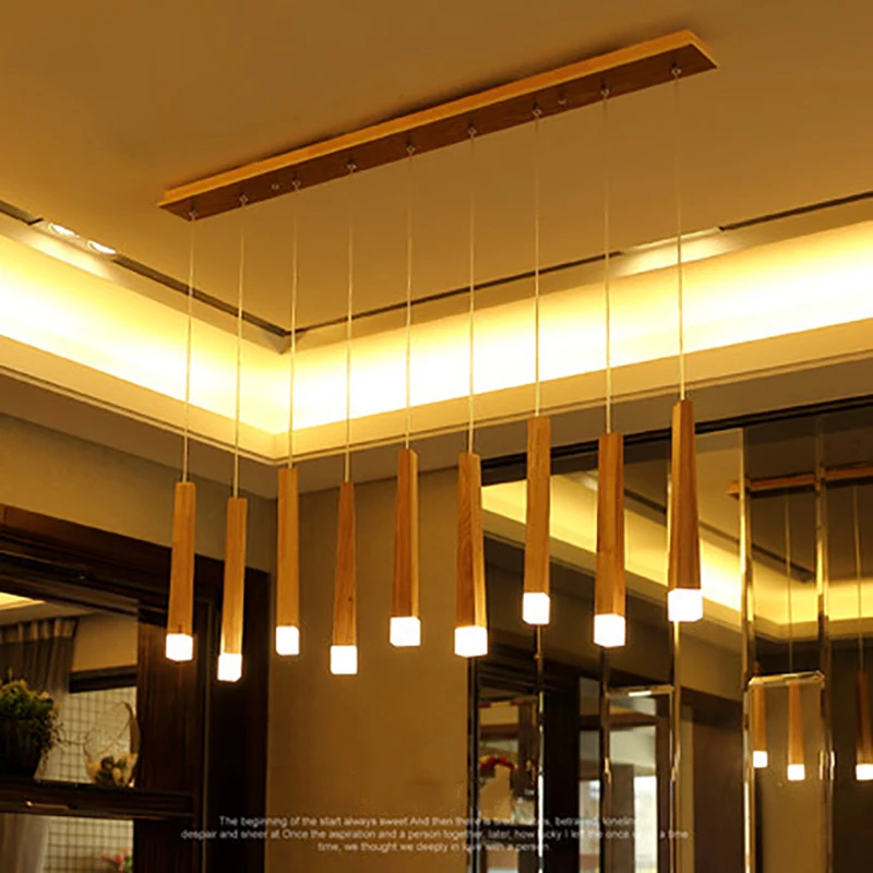 

2018 new art personality simple restaurant study bedroom three single head modern LED solid wood long match stick chandelier