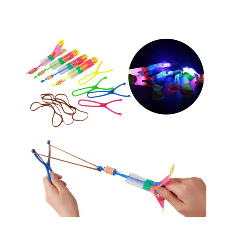 

8pcs LED Light Slingshot Flying Catapult Shining Outdoor Boy Toys For Children Kids Plastic Sport Flash Education Toy