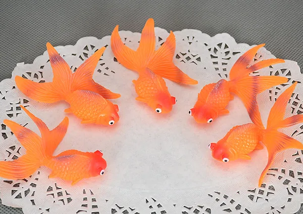 Marine animal models of simulation fish toy red cu...