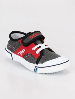 

Canvas sneakers with tear