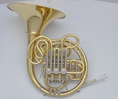 

High grade gold lacquer Four key French Horn with case.Bb/F
