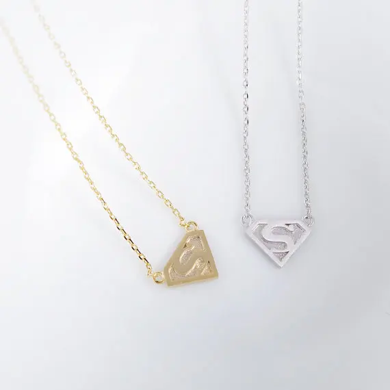 Gold Silver Super S Logo Necklace.jpg