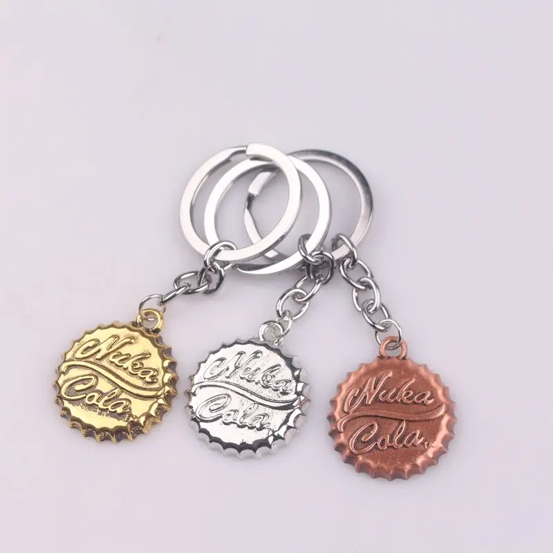 

Fashion metal accessories Game Fallout series Nuka Cola Keychain Three colors available