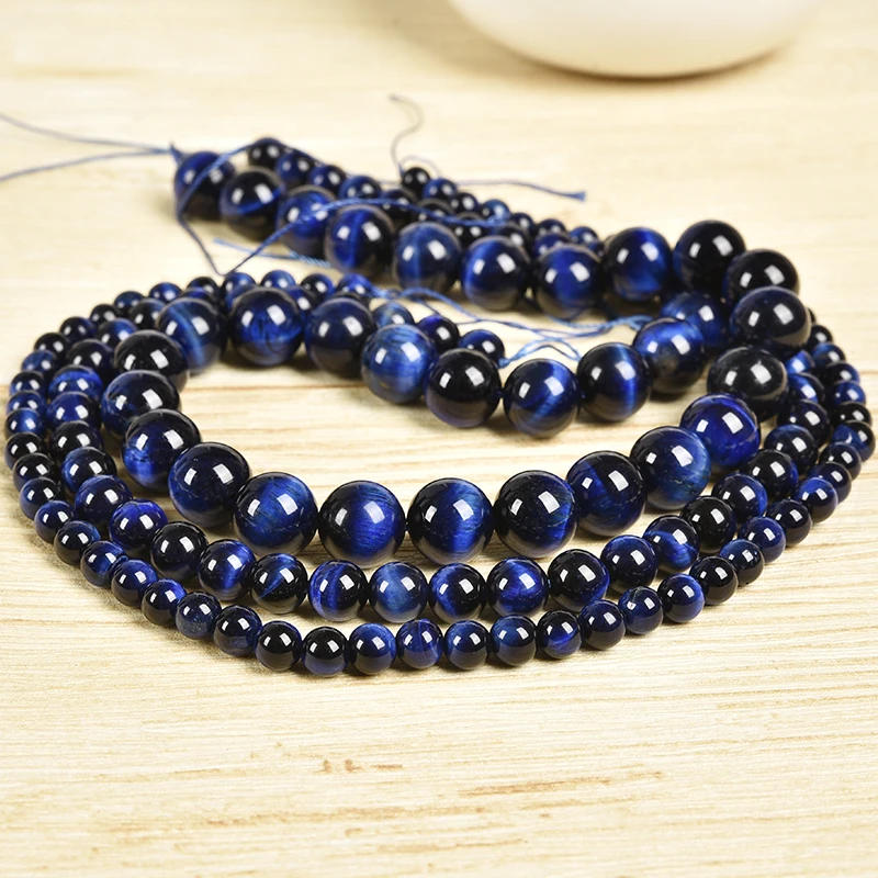 

6/8/10/12 mm Various sizes are Different textures Turquoise blue and navy blue Synthesis Blue Tiger Eyes Loose beads .