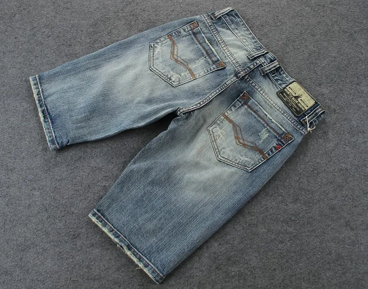 Высокое качество Шорты джинсы мужские синие джинсовые Moto джинсы Оригинальный бренд Шорты 29-38 мужские укороченные джинсы Рваные до колен