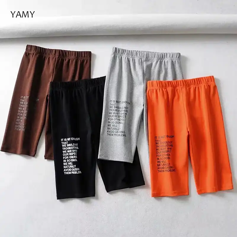 black and orange biker shorts