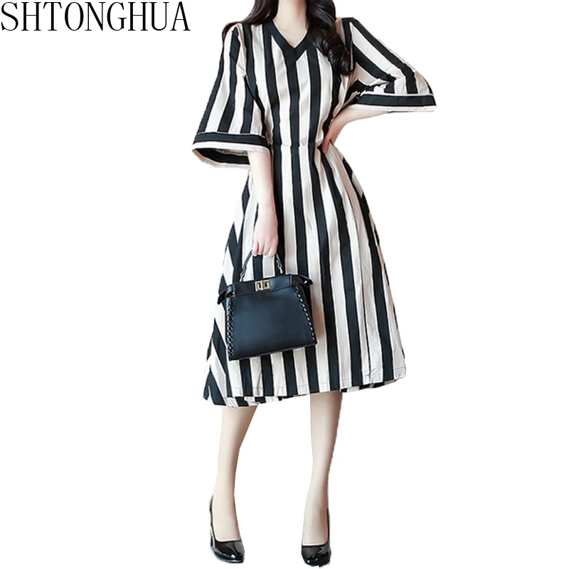 

SHTONGHUA Women Black White Striped Dress Summer Korean Half Sleeve Tie Back Bow Loose Dress Female Casual Big Swing OL Dress